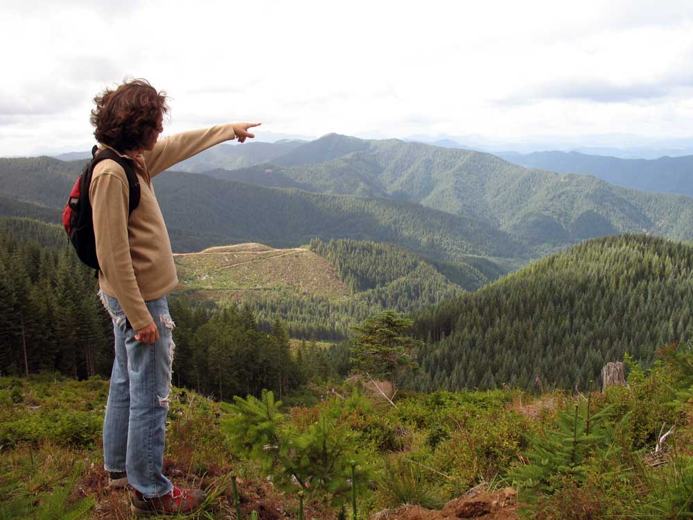 Diana pointing to Nehalem Bay.